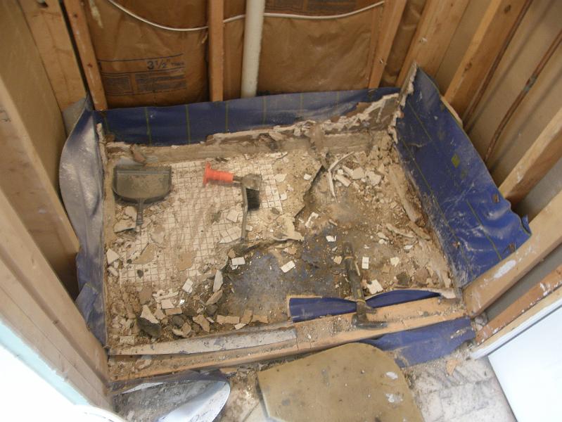 06 Tearing our the Shower Floor.JPG